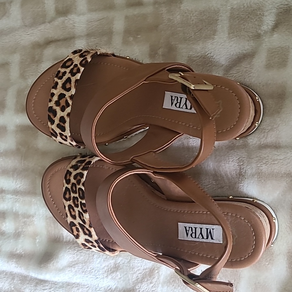 Myra leopard sandals with cork heals.